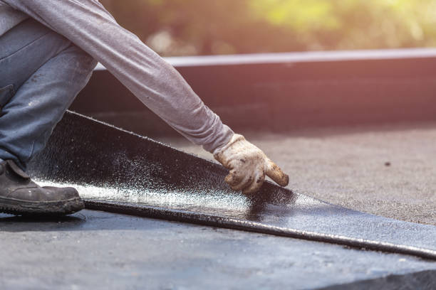 Professional Basement Waterproofing technician working in Charleston, IL